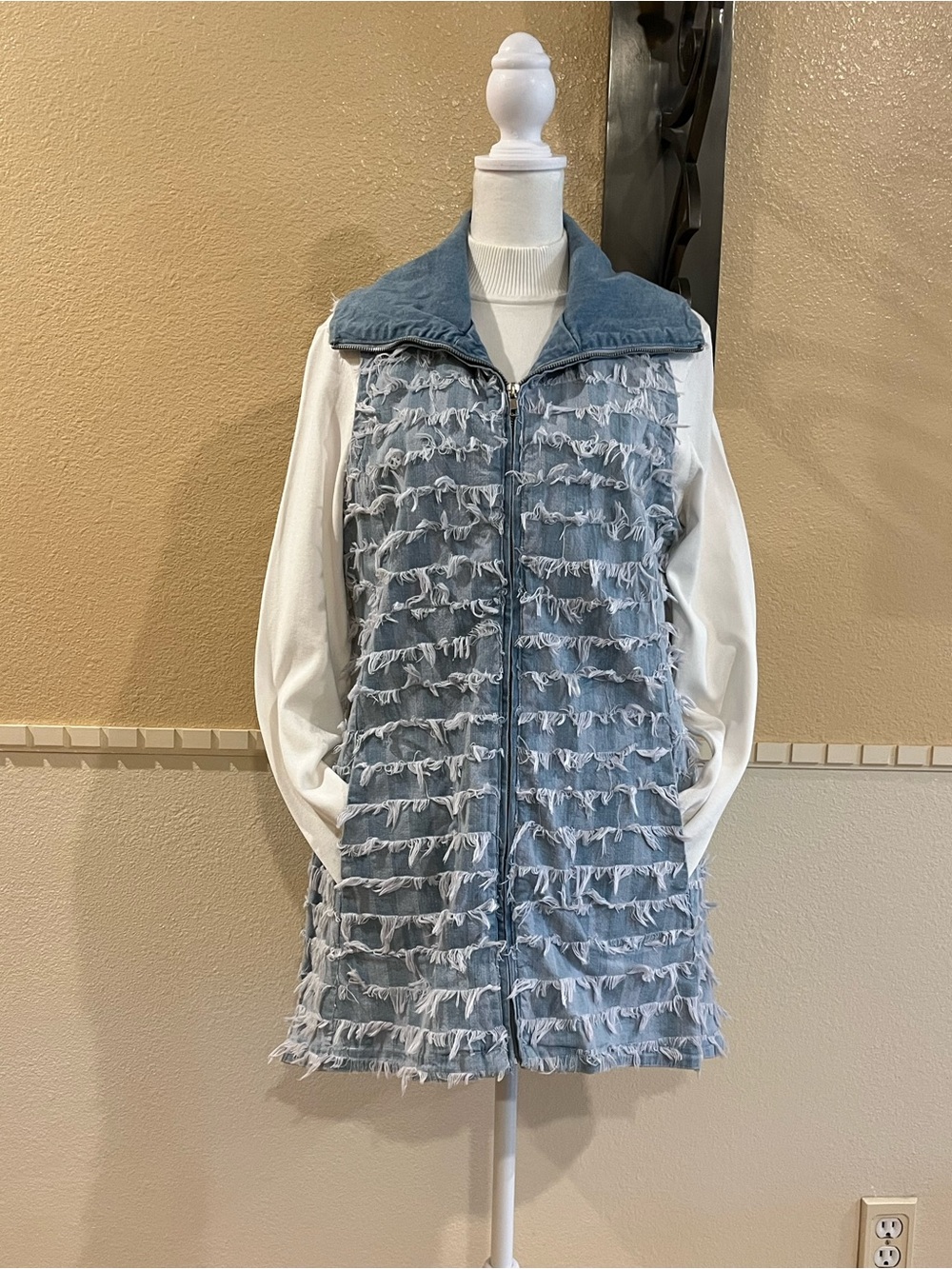 Denim / jean long vest w/ shaggy, eyelash finish. Front zipper, pockets. M. NWT
